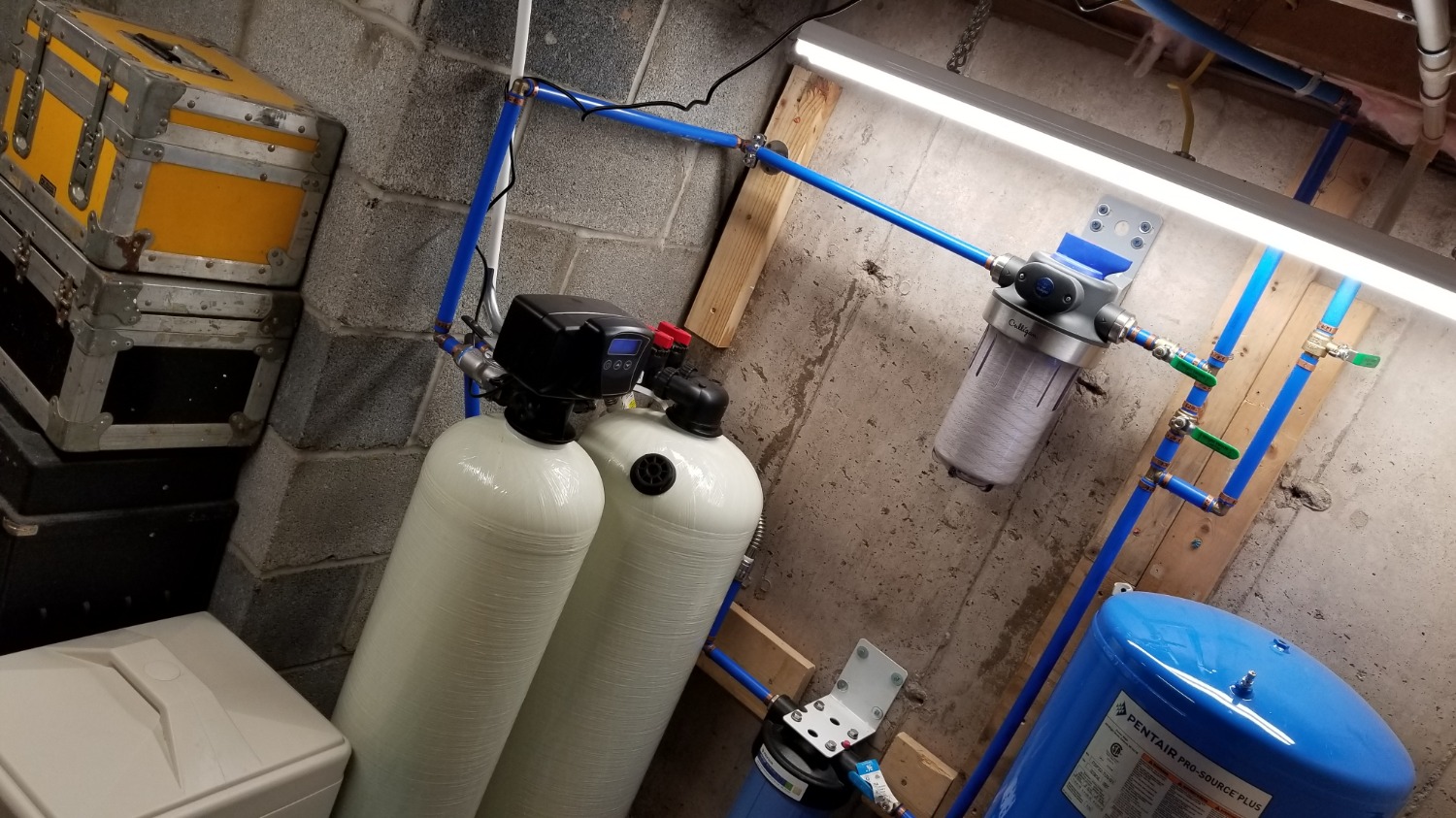 Self-installed Fleck 5600SXT water softener and acid neutralizer in basement